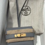 BNIB Hermes Kelly Festival Charm Gris Pantin Leather Gold Hardware